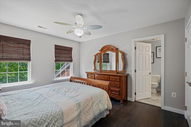 450 Marley Run, Huntingtown, MD 20639 - bedroom featuring connected bathroom, a ceiling fan, baseboards, wood finished floors, and visible vents