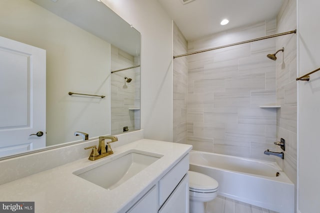 full bath with shower / tub combination, vanity, and toilet