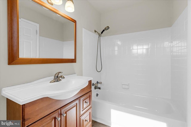 bathroom featuring vanity and tub / shower combination