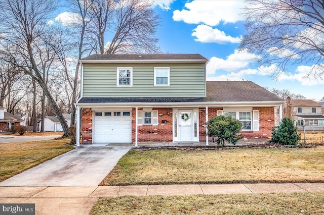 front of property featuring a garage and a front lawn