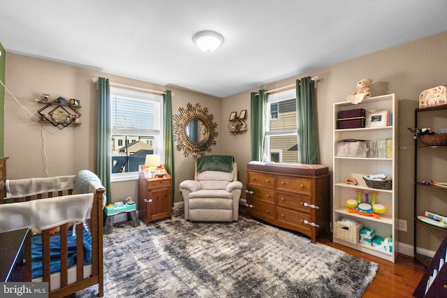 sitting room featuring wood finished floors and baseboards