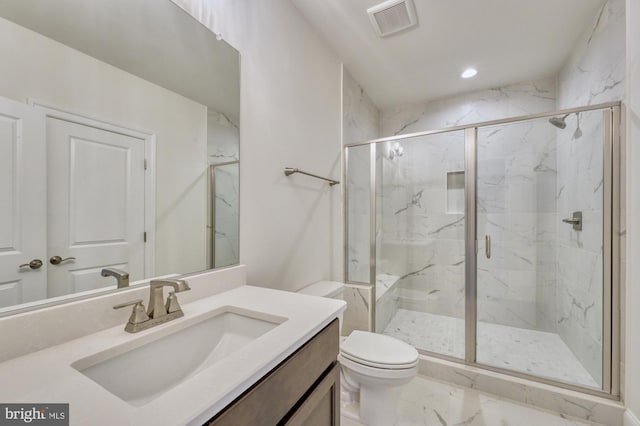 full bathroom with marble finish floor, a marble finish shower, visible vents, and vanity