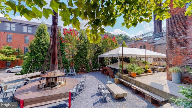 view of patio / terrace with a gazebo and an outdoor fire pit