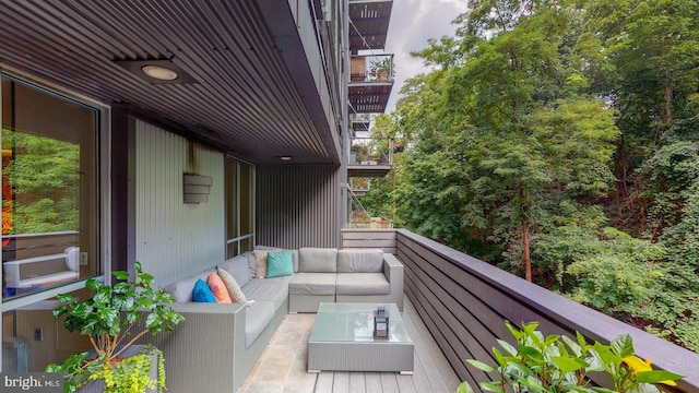 balcony with an outdoor hangout area