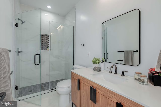 full bath with toilet, recessed lighting, a marble finish shower, and vanity