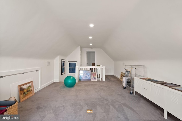 additional living space featuring carpet flooring, lofted ceiling, baseboards, and recessed lighting