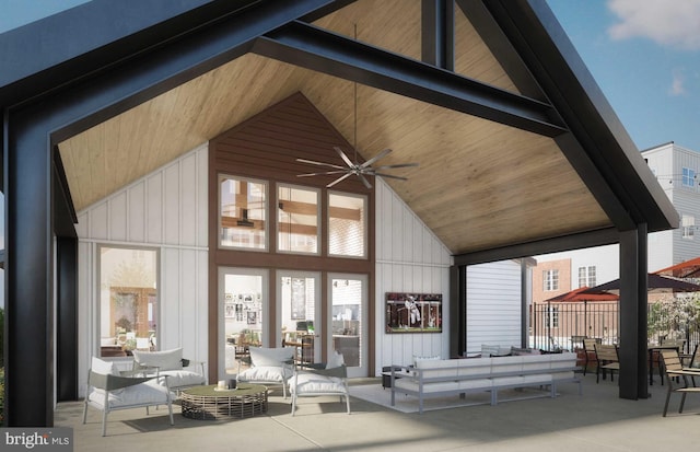 exterior space with a patio, board and batten siding, outdoor lounge area, and a ceiling fan