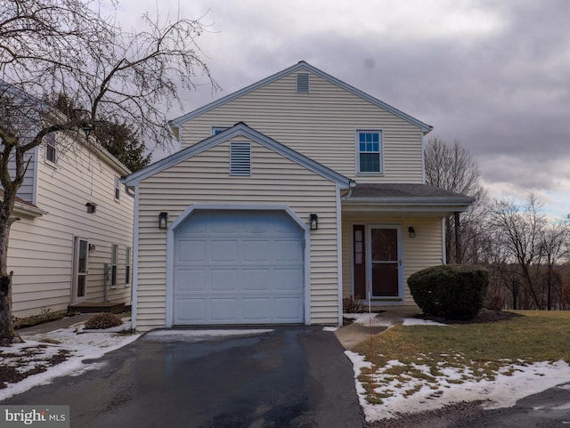 view of front of home with a garage