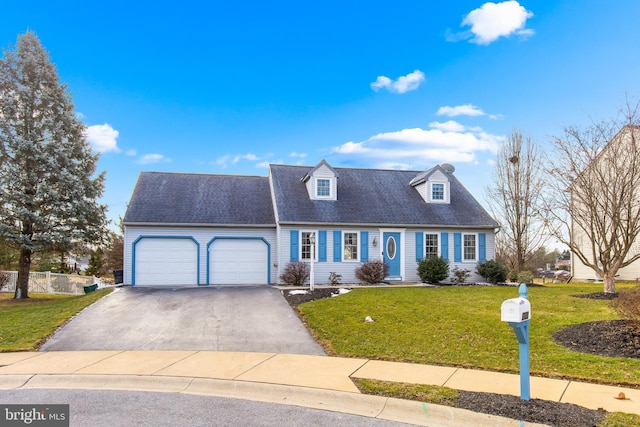 cape cod home with a garage and a front lawn