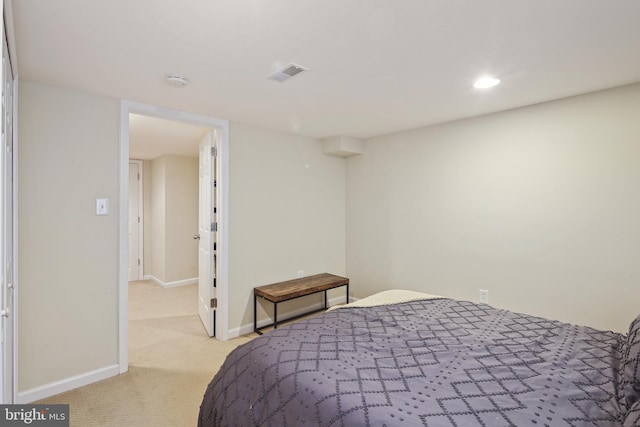 bedroom with baseboards, recessed lighting, visible vents, and light colored carpet