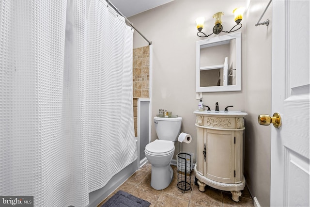 full bathroom with shower / tub combo with curtain, sink, and toilet