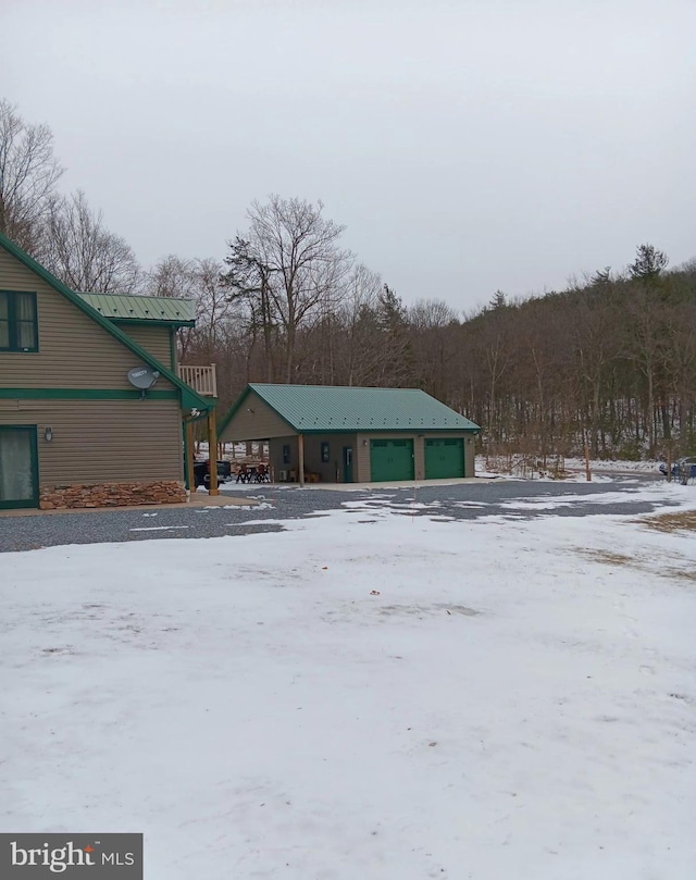 exterior space featuring a detached garage