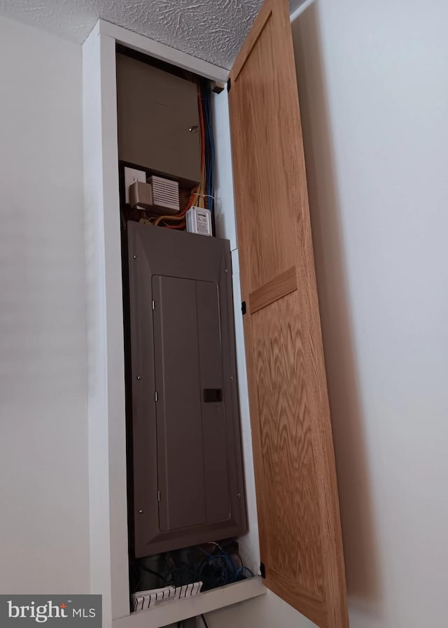 utility room featuring electric panel