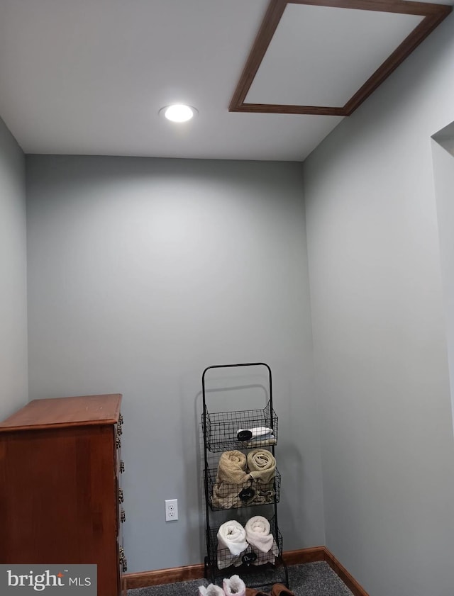 miscellaneous room with recessed lighting, carpet, and baseboards