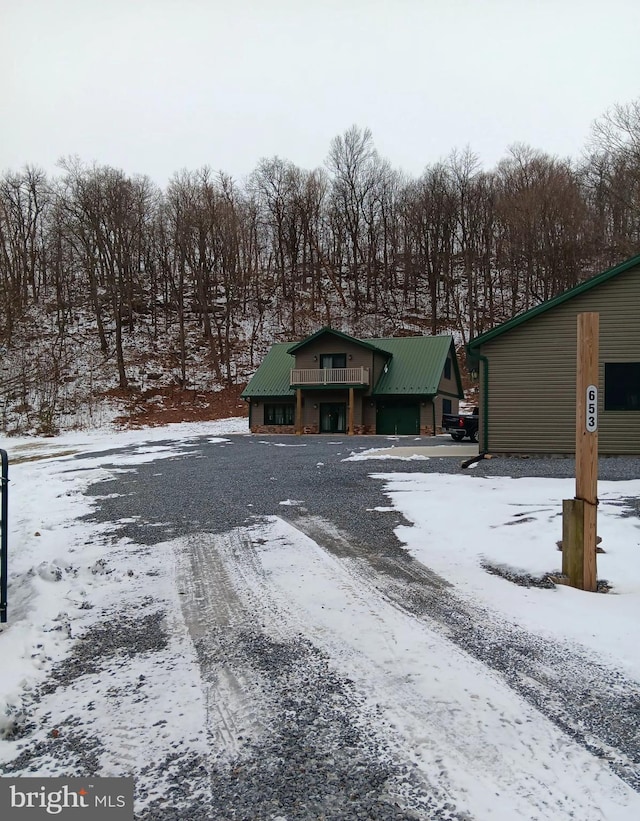 view of front of property featuring metal roof