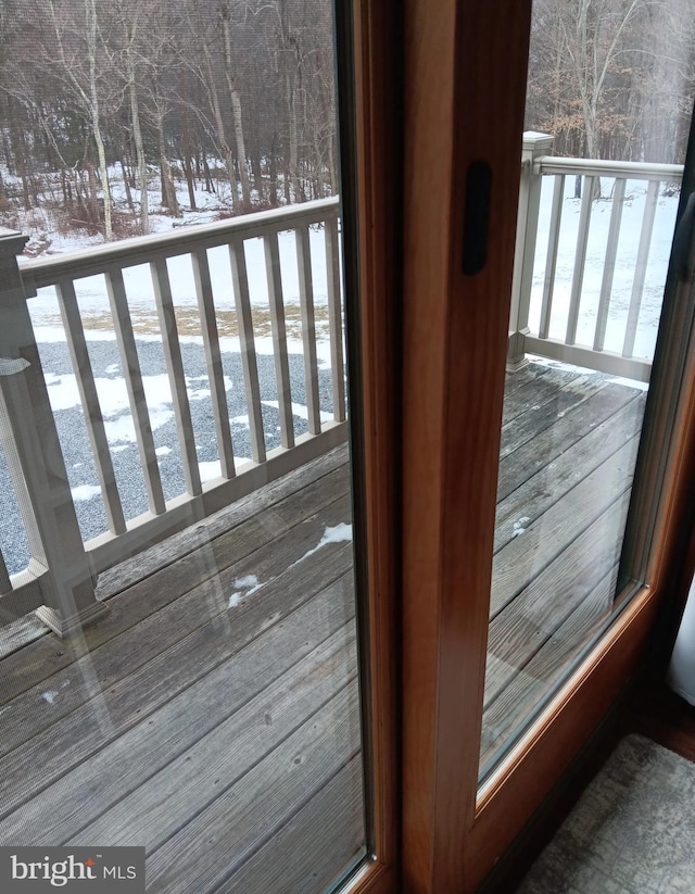 view of snow covered deck