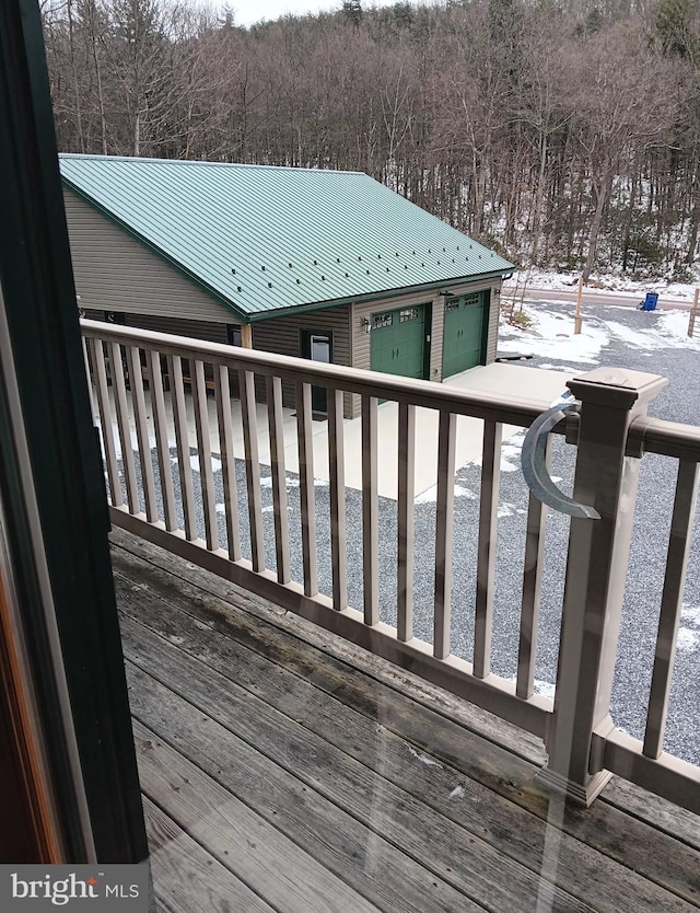 view of snow covered deck