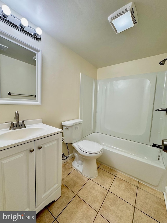 bathroom with tile patterned flooring, visible vents, vanity, and  shower combination