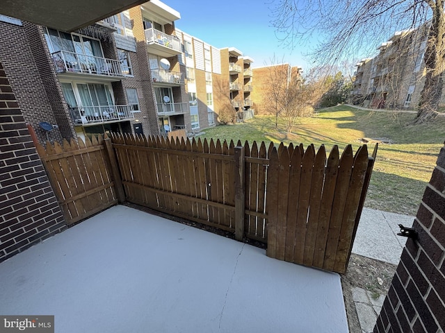 view of patio / terrace featuring fence