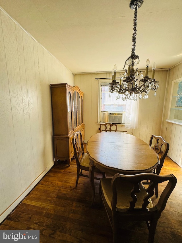 dining space with dark wood-type flooring