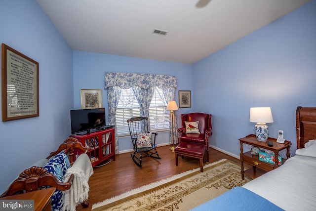 bedroom featuring dark wood-type flooring