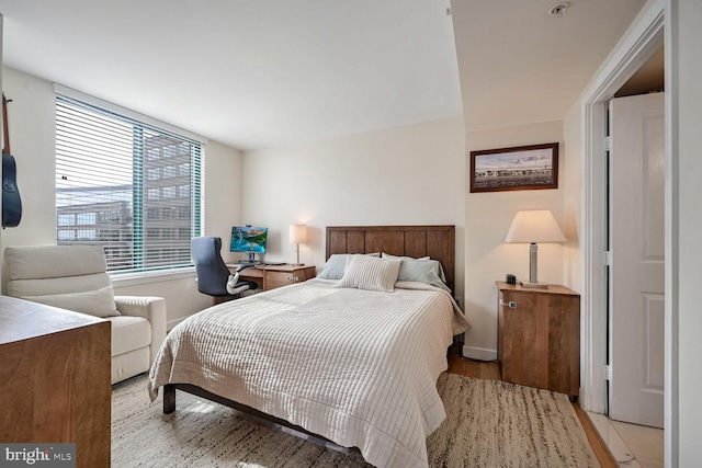 bedroom featuring light wood-type flooring