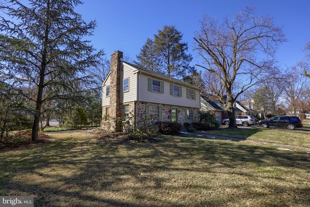 view of property exterior with a yard