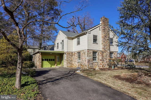 view of property exterior with a carport