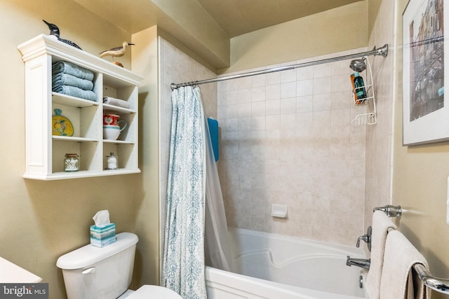 full bathroom featuring shower / bath combination with curtain and toilet