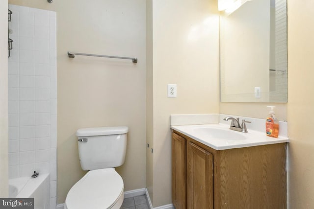 full bathroom with shower / bath combination, vanity, tile patterned flooring, and toilet