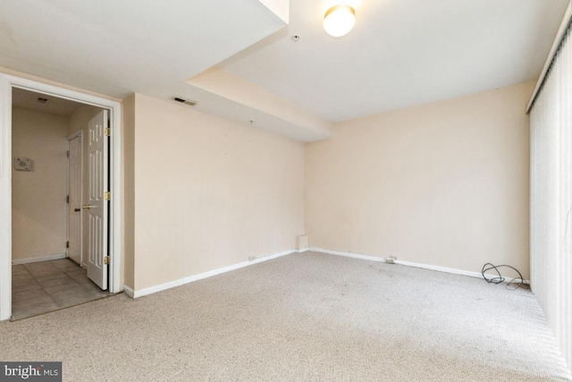 empty room featuring carpet