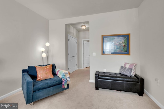 living area with carpet flooring