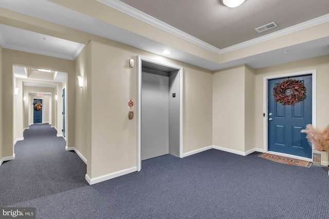 interior space featuring ornamental molding, dark colored carpet, and elevator