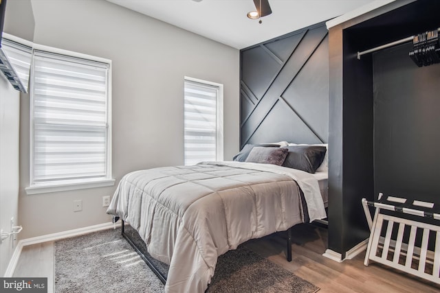 bedroom with wood-type flooring