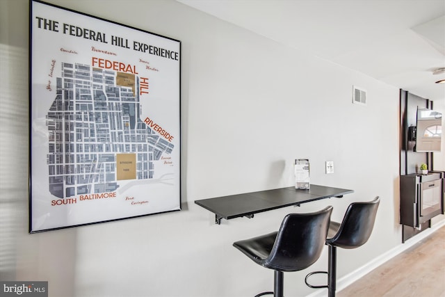 office area featuring hardwood / wood-style floors