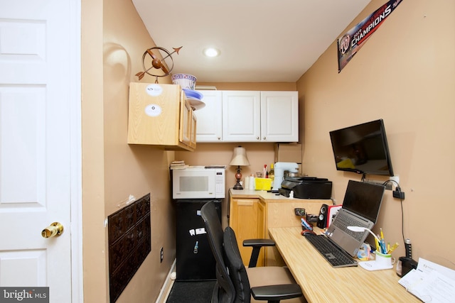 home office with recessed lighting