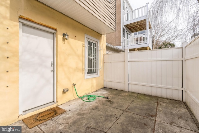 view of patio with fence