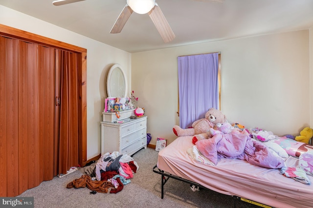 bedroom with ceiling fan and light colored carpet