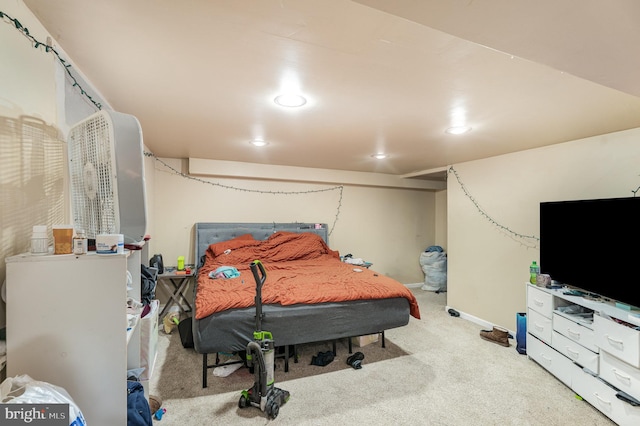 bedroom with light colored carpet