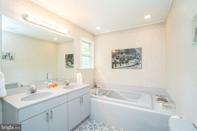 full bathroom with double vanity, a bath, toilet, tile patterned flooring, and wallpapered walls
