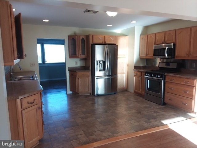 kitchen featuring sink and appliances with stainless steel finishes