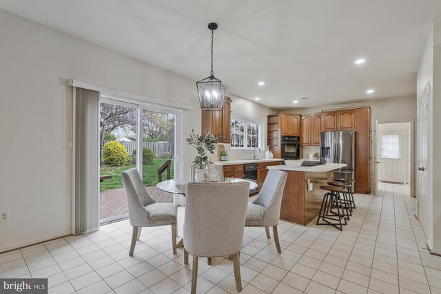 dining room featuring recessed lighting and light tile patterned flooring