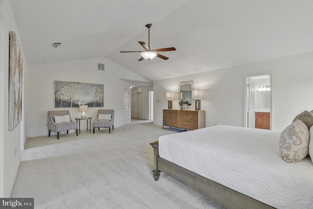 carpeted bedroom featuring ceiling fan, ensuite bath, vaulted ceiling, and visible vents