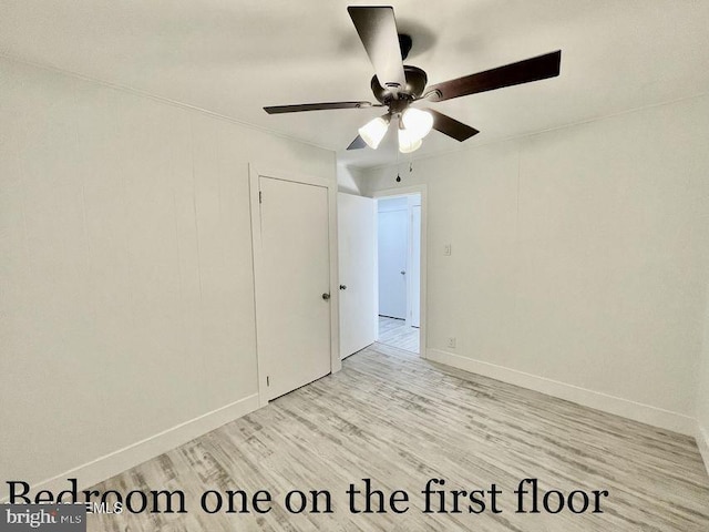 unfurnished room with light hardwood / wood-style flooring and ceiling fan