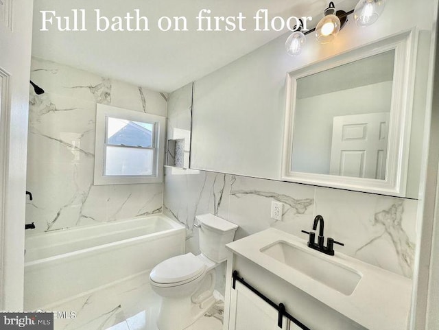 full bathroom featuring tile walls, toilet, vanity, and tiled shower / bath