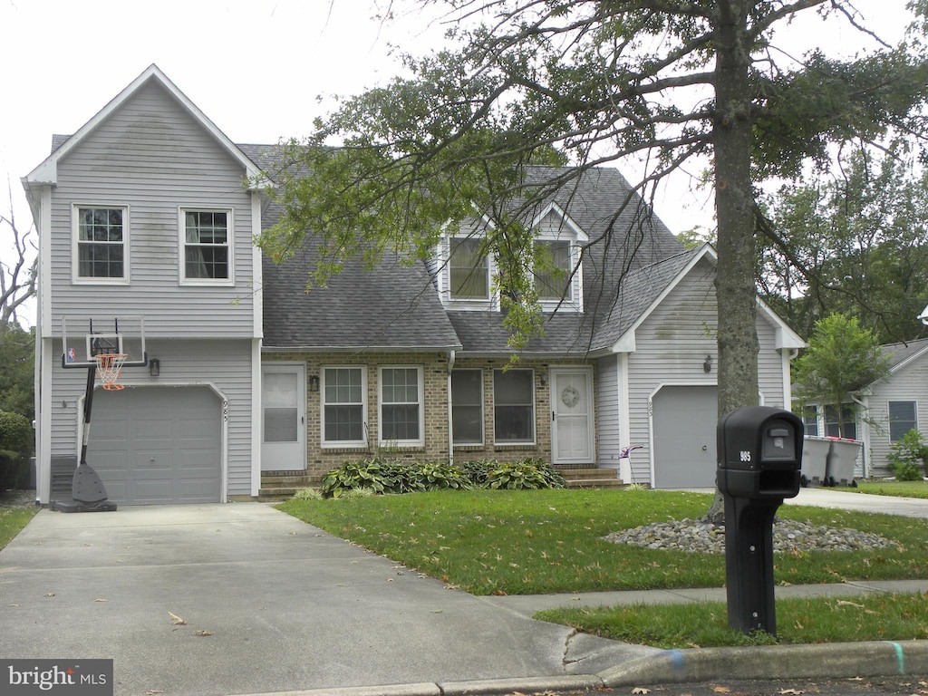 983 Magnolia Rd, Vineland, NJ 08360 - view of front of property with a garage and a front lawn