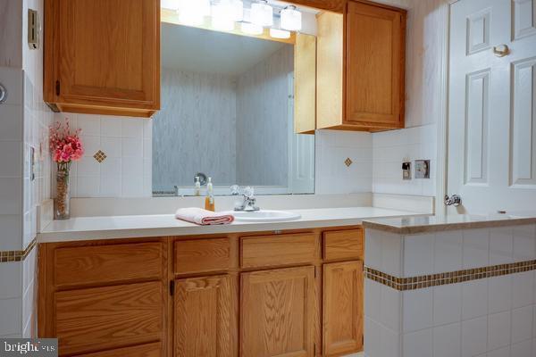 kitchen with sink and backsplash