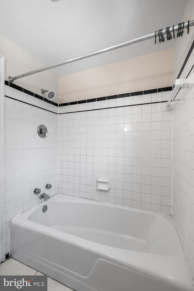 full bathroom with tile patterned flooring and shower / washtub combination