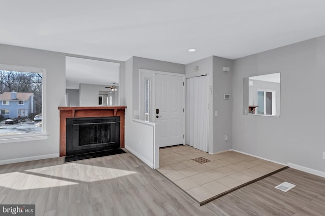 foyer with light hardwood / wood-style floors