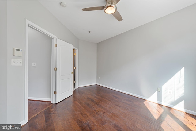 unfurnished bedroom featuring baseboards, ceiling fan, and hardwood / wood-style floors